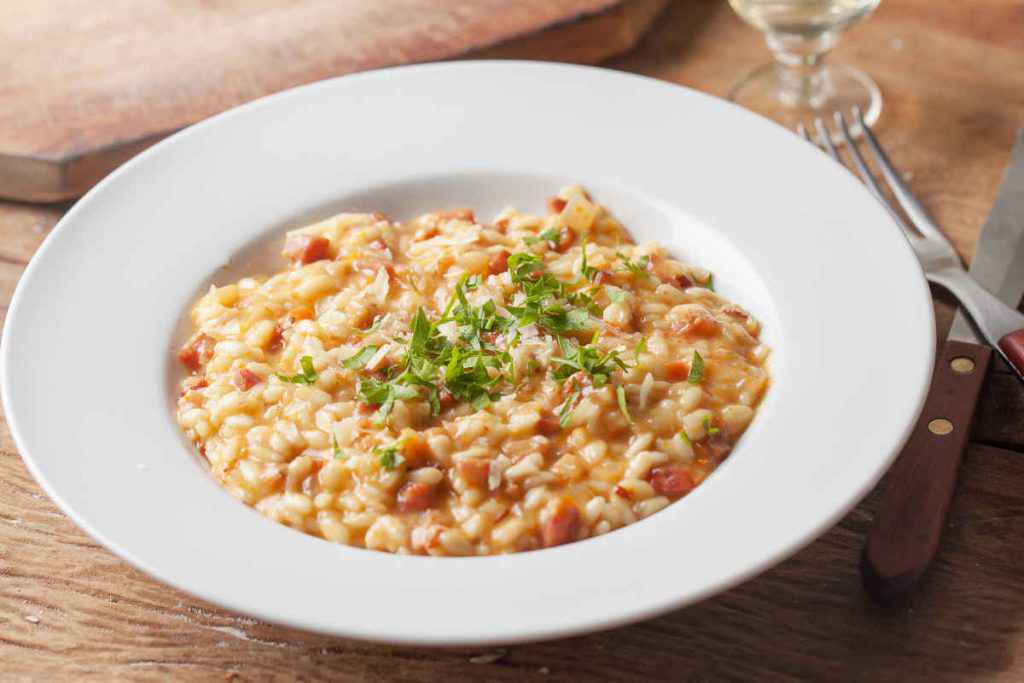 porzione di risotto alla salsiccia