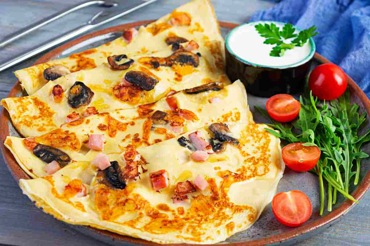 Crepes con prosciutto e funghi ricetta