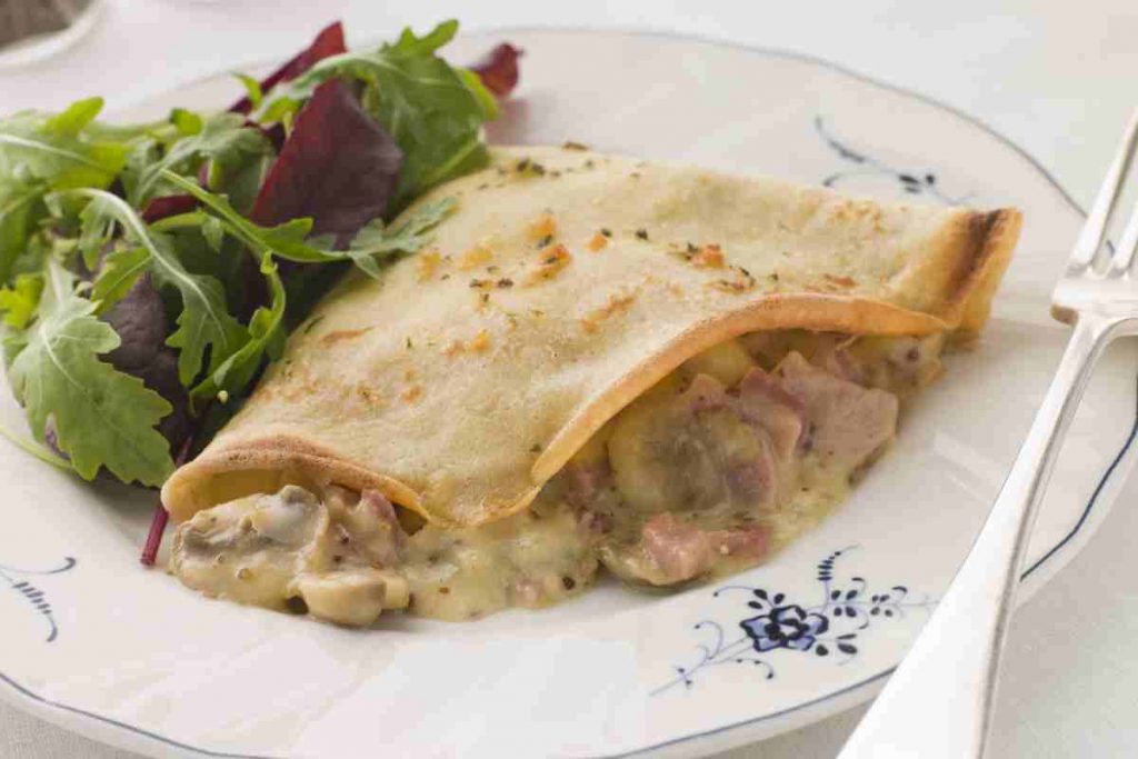 Crepes prosciutto funghi e besciamella ricetta