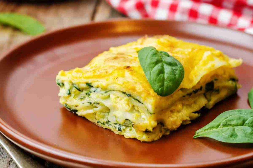 Lasagna spinaci, scamorza e besciamella nel piatto