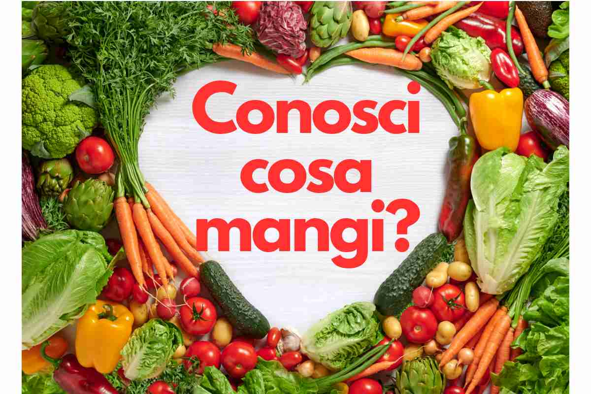 Verdure sul tavolo con cuore al centro e la scritta Conosci cosa mangi?