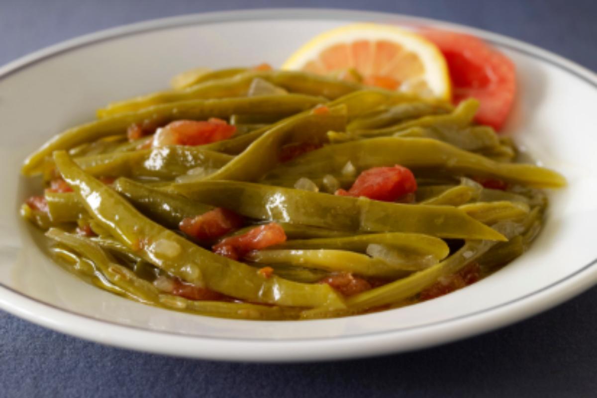 Fagiolini al sugo con spicchio di limone