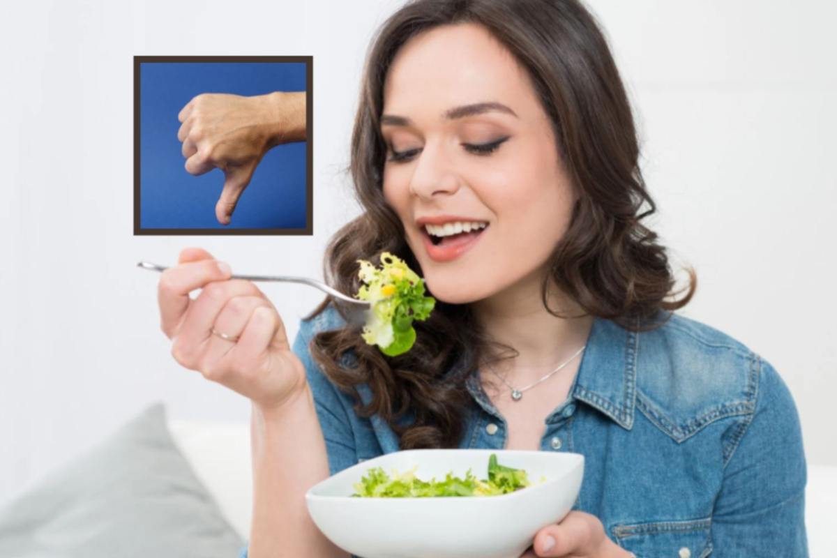 donna che mangia insalata e nel riquadro pollice rivolto verso il basso