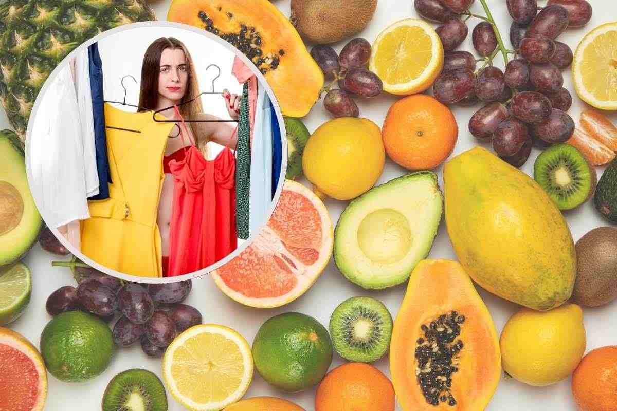 frutti vari e ragazzo con abiti in cornice
