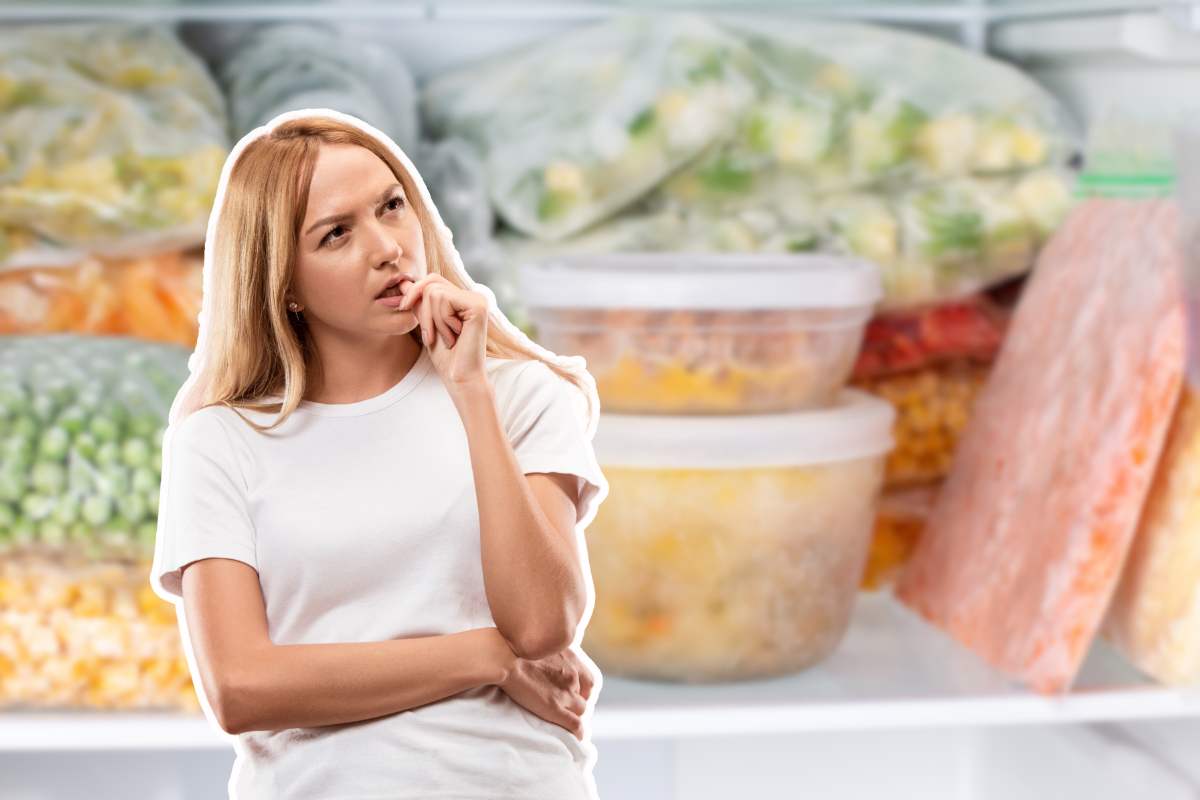 alimenti in congelatore e donna pensierosa