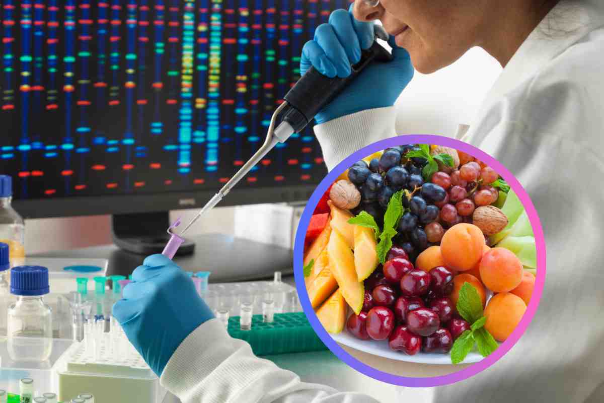 Una scienziata in laboratorio e della frutta