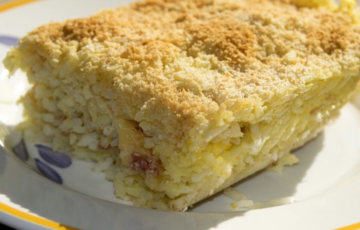 fetta di timballo con riso zucca e besciamella