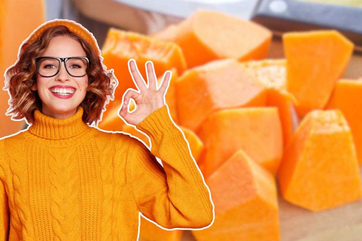 pezzi di zucca sullo sfondo e ragazza con gli occhiali in primo piano