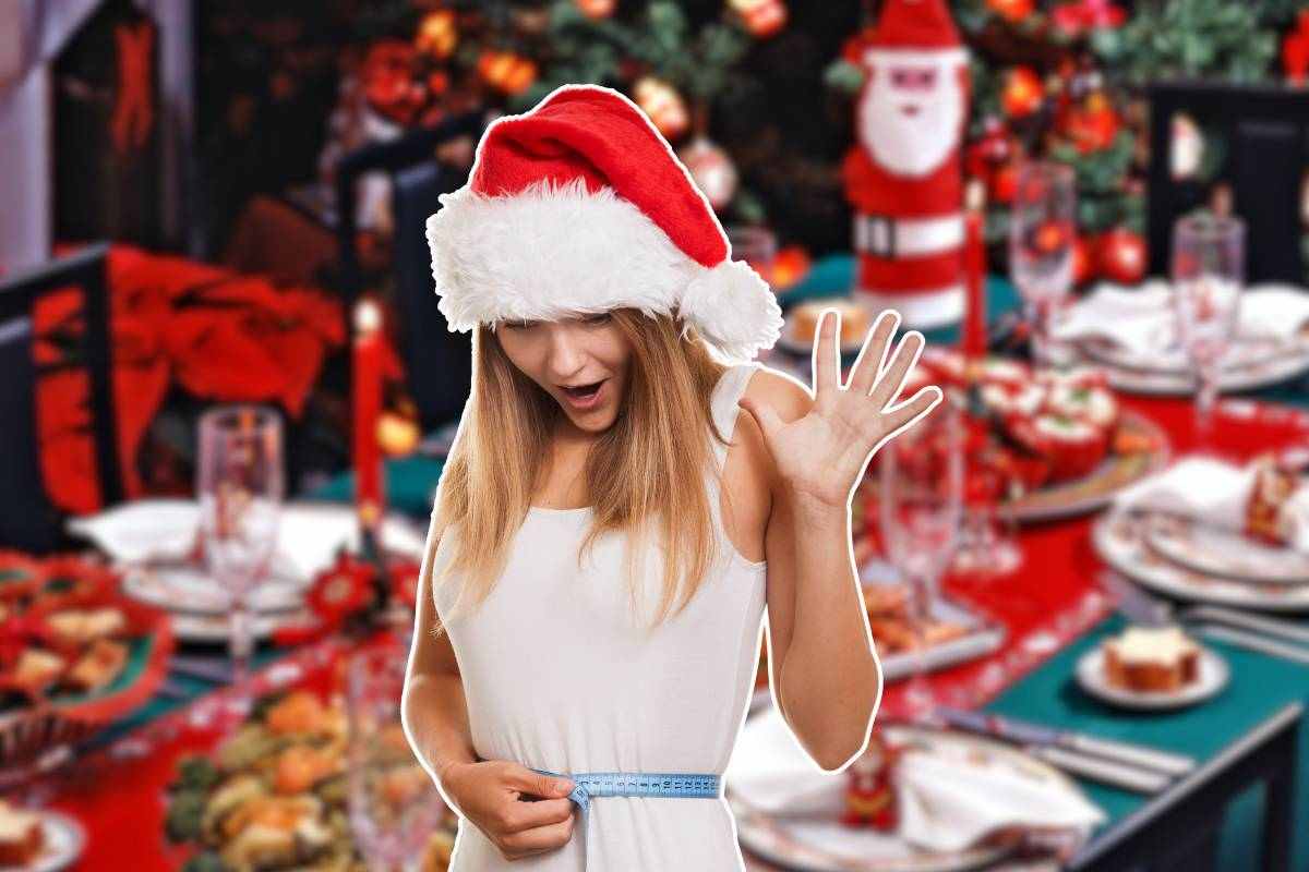 ragazza che si misura i cm della vita e tavolata natalizia