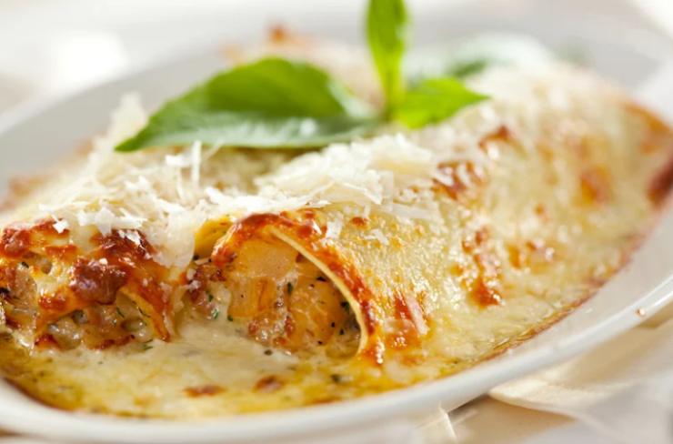 cannelloni con besciamella ripieni di stracchino e speck