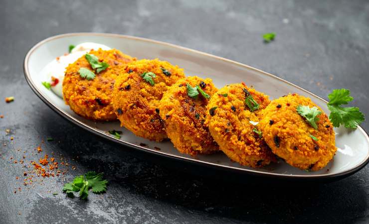 piatto con fette di cotechino fritto