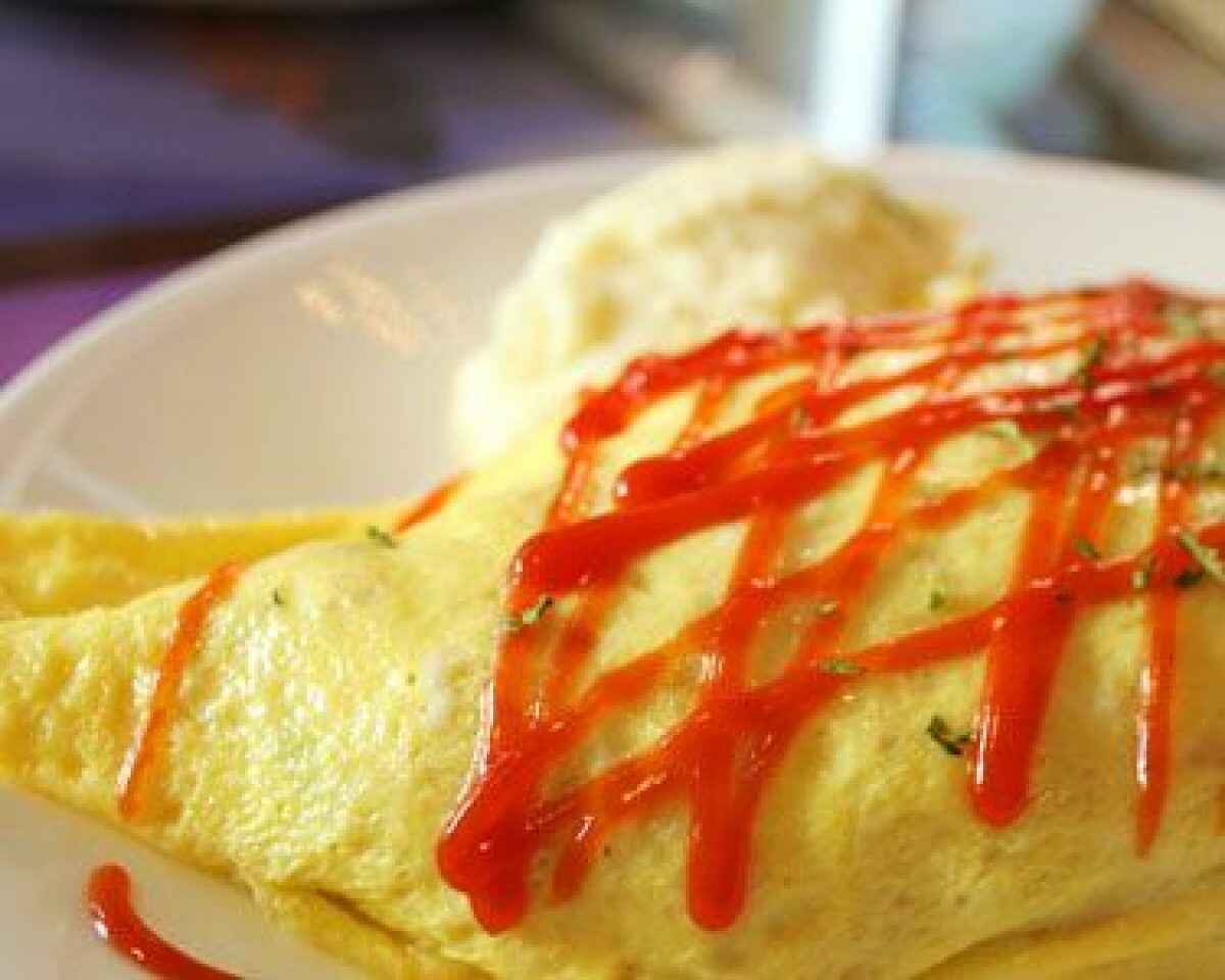 Riso con omelette di granchio