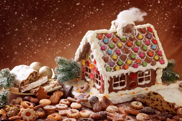 Homemade gingerbread house and christmas cakes