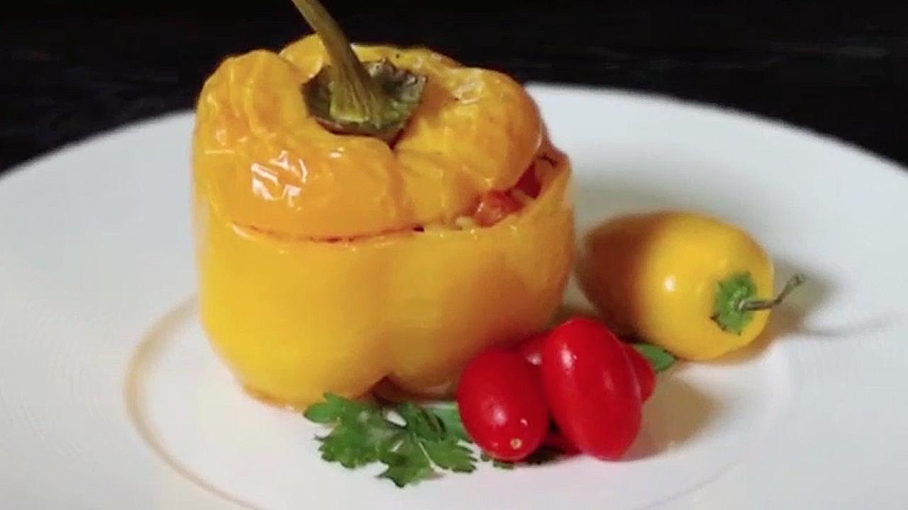 La videoricetta dei peperoni ripieni di riso